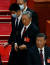 지난 22 일 중국공산당 20차 당 대회 폐막식 도중 후진타오(가운데) 전 국가주석이 행사 도중 퇴장하고 있다. 로이터=연합뉴스