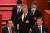 79세의 후진타오(왼쪽 세번째) 전 중국 국가주석이 22일 베이징 인민대회당에서 열린 공산당 20차 전국대표대회 폐막식 도중 퇴장하는 모습. 리커창 총리(왼쪽 첫번째)와 시진핑 주석(맨 오른쪽)의 모습이 보인다. [AP=연합뉴스]