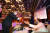 권덕철 전 보건복지부 장관이 지난해 10월 1일 서울 중구 대한상공회의소에서 열린 제25회 노인의 날 기념식에서 100세 어르신에게 청려장(장수지팡이)을 전달하고 있다. 연합뉴스