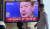 30일 오전 서울역 대합실에서 시민들이 윤석열 대통령의 이태원 압사 사고 관련 대국민담화 방송을 지켜보고 있다. 연합뉴스