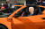 지난 9월 14일(현지시간) 미국 내 전기차 생산을 촉구하기 위해 미시간주 디트로이트에서 열리는 북미 국제자동차쇼 전시회장에서 전기차인 쉐보레 콜벳 Z06에 시승한 조 바이든 대통령. AFP