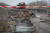 12일(현지시간) 우크라이나 남부 지역 미콜라이프에서 전투 끝에 불에 탄 군용차가 길가에 놓여 있다. AP=연합뉴스