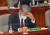 이종섭 국방부 장관이 14일 서울 여의도 국회에서 열린 예산결산특별위원회 전체회의에서 자료를 살펴보고 있다. 연합뉴스