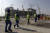 외국인 노동자들이 지난 2019년 12월 20일 카타르 루사일의 월드컵 경기장을 건설하기 위해 공사장으로 걸어가고 있다. AP=연합뉴스