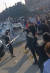 지난 23일 중국 허난성 정저우시 폭스콘 공장에서 노동자들이 열악한 근무 환경 등에 항의하며 방역복을 입은 보안요원 등과 대치하며 시위를 벌이고 있다. AFP=연합뉴스