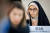 카디예 카리미 이란 여성가족부 부통령이 24일(현지시간) 스위스 제네바에서 열린 유엔 인권이사회 특별회의에서 성명을 듣고 있다. AFP=연합뉴스