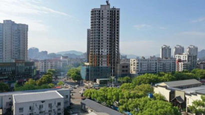 중국도 곳곳서 아파트 공사 중단…"380조원대 대출 부실 위기"