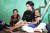 윤석열 대통령 부인 김건희 여사가 12일(현지시간) 프놈펜 선천성 심장 질환을 앓고 있는 14세 아동의 집을 찾아 건강상태를 살피고 위로하고 있다. 뉴시스. 