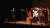 연극 ‘스카팽’ 배리어프리버전이 지난달 26~28일 서울 명동예술극장에서 공연됐다. 6명의 수어통역사가 검은 모자와 조끼, 바지를 맞춰 입고 배우들과 함께 무대에 섰다. 붕대를 감고 테이블에 누운 이가 주인공 스카팽(이중현)이다. [사진 국립극단]