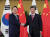 윤석열 대통령과 시진핑 중국 국가주석이 지난달 15일 인도네시아 발리에서 열린 한·중 정상회담에서 악수하고 있다. [연합뉴스]