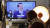 지난 15일 오후 울산 남구 신정시장에서 한 상인이 윤석열 대통령이 주재하는 국정과제 점검회의를 TV 생중계를 통해 시청하고 있다. 뉴스1