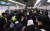 전장연 회원들이 14일 오전 서울 용산구 삼각지역에서 지하철 탑승 시위 도중 경찰과 갈등을 빚고 있다. 뉴스1