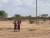 지난 7일(현지시간) 케냐 투르카나주의 나크와메키 마을에서 어린 아이들이 취재진을 향해 하트를 보내고 있다. [외교부 공동취재단(케냐 투르카나주)]