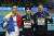 18일 호주 멜버른에서 열린 수영 쇼트코스 세계선수권 자유형 200m에서 금메달을 딴 황선우(가운데)가 다비드 포포비치(왼쪽), 톰 딘과 함께 포즈를 취하고 있다. [AP=연합뉴스]