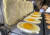 지난 14일 서울 동대문구 신설동에서 한 상인이 계란빵을 만들고 있다. [뉴시스]