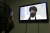 한 아프간 소녀가 22일(현지시간) 아프가니스탄 수도 카불에서 텔레비전을 통해 탈레반 고등교육부 장관 대행 네다 무함마드 나딤의 연설을 보고 있다. EPA=연합뉴스
