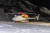 25일(현지시간) 10명 안팎이 매몰된 것으로 알려진 눈사태 관련, 오스트리아 동부 취르스 스키장에 구조 헬리콥터가 서 있다. AFP=연합뉴스