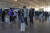 29일(현지시간) 중국 베이징의 국제공항에서 여행객들이 출국을 준비하고 있다. AP=연합뉴스 