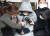 제주 유명 식당 대표 강도살인 피의자인 50대 김모씨가 지난달 28일 오후 제주동부경찰서에서 검찰로 송치되고 있다. 뉴스1