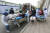 지난달 31일 중국 남서부 쓰촨성의 한 병원에서 의료진이 구급차에 실려오는 코로나19 환자들을 받고 있다. AP=연합뉴스