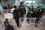 지난 9일 인천국제공항에 도착한 중국발 입국자들이 코로나19 검사센터에서 검사를 받기 위해 접수하고 있다. 연합뉴스 