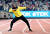  2017년 은퇴 경기인 런던 세계선수권에서 우사인 볼트가 특유의 세리머니를 하는 모습. EPA=연합뉴스