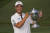 지난해 8월 윈덤 클래식에서 PGA 투어 첫 우승을 차지한 김주형. 당시 CJ 로고가 달린 모자를 썼다. AP=연합뉴스