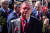 빨간 물감을 뒤집어 쓴 안드레예프 대사가 취재진 카메라를 바라보고 있다. AFP=연합뉴스