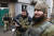13일 우크라이나 마리우폴에 진입한 러시아군. TASS=연합뉴스