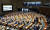 30일 오후 국회에서 열린 본회의에서 국민의힘 의원들이 양곡관리법 개정안 부의의 건 표결에 참여하지 않은 채 퇴장하면서 의석들이 비어 있다. 연합뉴스