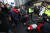 6일 낮 이태원 참사 희생자 유족들이 서울시청 진입을 시도하다 쓰러진 모습이다. 사진 연합뉴스.