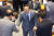더불어민주당 박홍근 원내대표가 13일 오전 국회에서 열린 본회의에서 교섭단체 대표 연설을 마친 뒤 의원들과 악수를 나누고 있다. 연합뉴스