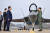 지난해 11월 경남 사천시 한국항공우주산업(KAI)에서 윤석열 대통령이 국산 초음속 전투기 KF-21 시범비행을 지켜본 후 조종사인 이진욱 중령의 거수경례를 받고 있다. 사진 대통령실