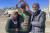 무너진 건물 밑에서 구조된 에르뎀 가족. 타하 에르뎀(17. 가운데)이 엄마 제일라(왼쪽) 아버지 알리와 함께 임시 숙소인 천막앞에서 17일(현지시간) AP 기자의 카메라를 향해 포즈를 취했다. AP=연합뉴스