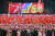 북한이 인민군 창건일(건군절) 75주년인 2월 8일 평양 김일성광장에서 열병식을 개최했다고 노동당 기관지 노동신문이 2월 9일 보도했다. 북한 주민들이 인공기를 흔들며 환호하고 있다. 뉴스1