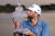 크리스 커크가 27일(한국시간) 미국 플로리다주 팜비치 가든스의 PGA 내셔널 골프장에서 열린 혼다 클래식 최종라운드에서 정상을 밟은 뒤 우승 트로피와 입을 맞추고 있다. 로이터=연합뉴스