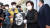 권양숙 여사가 지난해 9월 서울 종로구 노무현시민센터에서 열린 개관식 행사에서 노무현 전 대통령 그림을 들고 웃고 있다. 연합뉴스