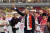 드미트리 리볼로프레프(가운데) AS 모나코 FC의 구단주가 2022년 5월 14일 모나코의 한 축구 경기장에서 시합에 앞서 손을 흔들어 보이고 있다. 리볼로프레프가 '탑건 매버릭' 제작에 자금을 댔다는 외신 보도가 최근 나왔다. AFP=연합뉴스