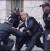 도널드 트럼프 전 미국 대통령이 수갑을 차고 연행되는 모습의 AI 생성 이미지. 엘리엇 히긴스 트위터 캡처