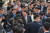윤석열 대통령이 지난 1일 오후 대구 서문시장에서 열린 '서문시장 100주년 기념식'에서 참석자들과 인사를 나누고 있다. 대통령실 