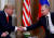 도널드 트럼프 전 미국 대통령(왼쪽)과 블라디미르 푸틴 러시아 대통령이 2018년 7월 16일 핀란드 헬싱키에서 만나 악수하고 있다. 로이터=연합뉴스