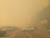 11일 오전 강원 강릉에서 발생한 산불이 강풍을 타고 확산하면서 경포대 하늘이 온통 노랗다. 사진 소방청 