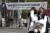 12일 오후 서울 강남구 한티역 인근 도로에 마약 음료 주의 문구와 마약 신고 번호가 담긴 현수막이 게시돼 있다. 뉴스1