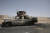 수단 군벌간의 무력충돌이 6일째 지속되는 가운데 수도 하르툼 남부의 한 도로에 불에 탄 군용 차량이 방치되어 있다. AP=연합뉴스
