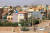 수단 군벌 간 무력충돌이 일어난 가운데 수도 하르툼 주택가에서 연기가 피어오르고 있다. AFP=연합뉴스 