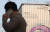 경기 성남시 판교 위메이드 본사 앞으로 시민들이 지나가고 있다. 위메이드가 발행한 가상화폐 위믹스는 지난해 연말 국내 5개 디지털거래소에서 상장폐지됐다가 지난 2월 이중 한 곳에서 재상장했다. [뉴스1]