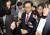 태영호 국민의힘 의원이 10일 국회 소통관에서 최고위원직 자진 사퇴 기자회견을 한 후 취재진의 질문을 받으며 이동하고 있다.