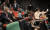 문재인 전 대통령과 부인 김정숙 여사가 12일 경남 양산시의 한 멀티플렉스 영화관에서 자신의 퇴임 후 일상을 다룬 다큐멘터리 영화 '문재인입니다'를 관람하기 위해 앉아있다. 연합뉴스