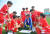 북한이 15일 동평양경기장에서 아시아축구연맹의 '대중 축구의 날' 행사를 진행했다고 조선중앙통신이 16일 전했다. 이날 행사에 참석한 선수와 코치가 작전회의를 하고 있다. [사진 조선중앙통신]