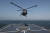 지난 16일 부산 인근 해상에서 항해 중인 세종대왕함(DDG)에서 링스 해상작전헬기가 이륙하고 있다. 해군